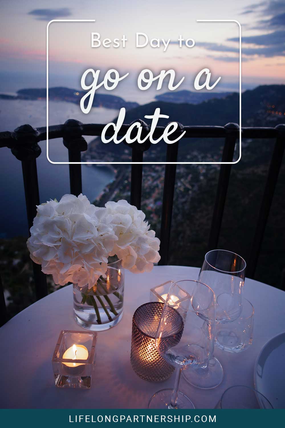 Flowers and candles on a table near mountains - Best day to go on a date