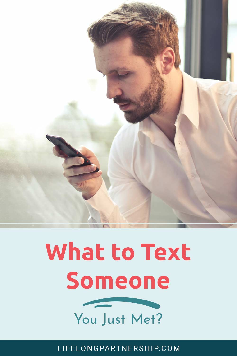 Man in white shirt using phone - What to Text Someone You Just Met?